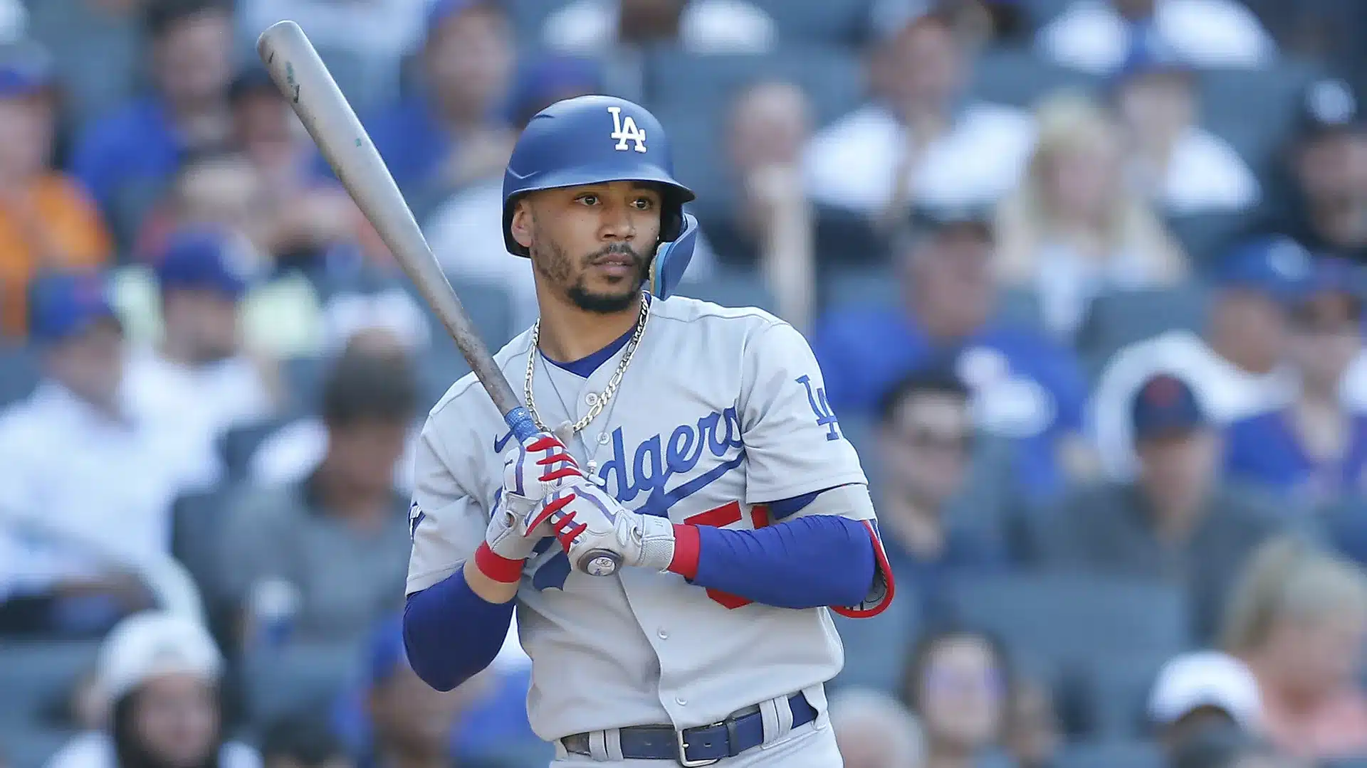 A baseball Washington Nationals vs Philadelphia Phillies game live holding a bat in front of a crowd