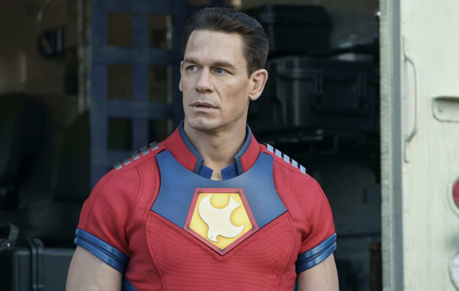 wwe - A man in a red shirt and blue shirt