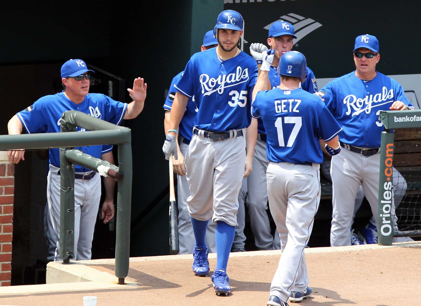 A group of baseball kansas city royalss walking on a field