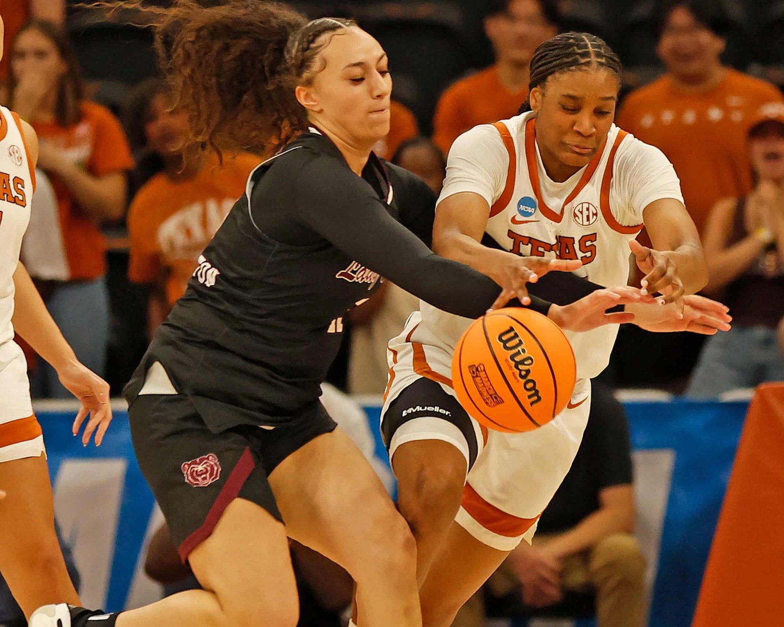 "ncaa mens games today - A man in a white uniform
