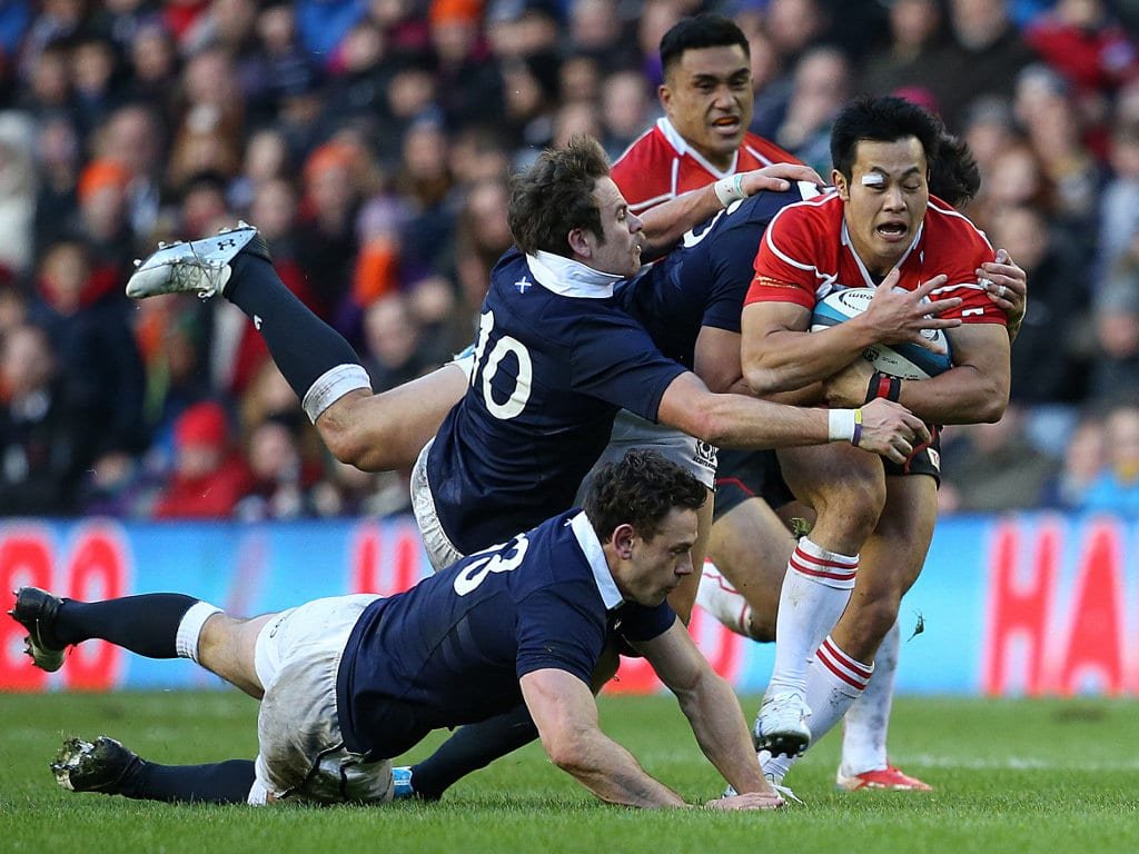 The Scotland vs Japan live streams of sporting club sporting club celebrate with the trophy after their win in the - stock...